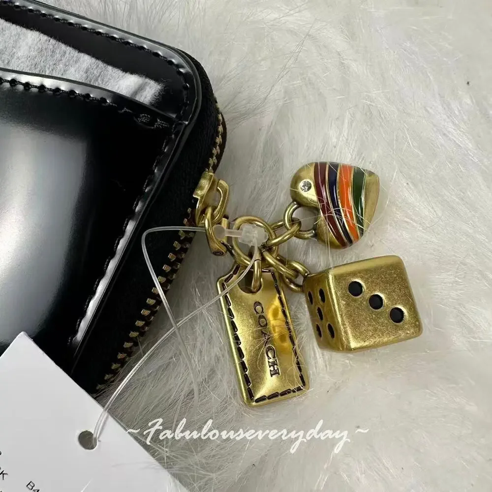 Coach Essential Small Zip Around Wallet With Charms In Leather/Brass/Black CCD82